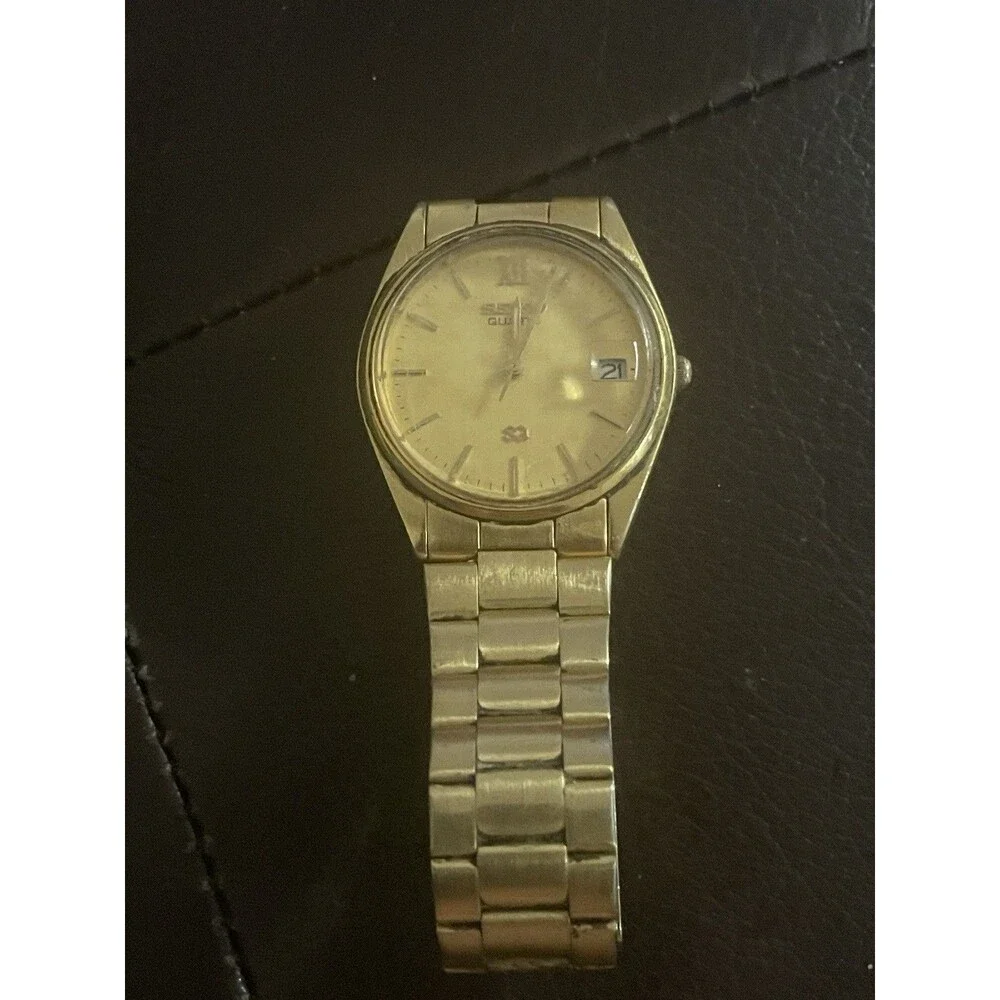 Seiko SQ Quartz 5Y22-6000 is a classic gold-tone men's dress watch 1990’s